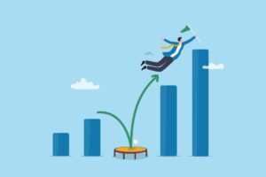 Homem pulando em gráfico de barras com bandeira. Precatório no Brasil.